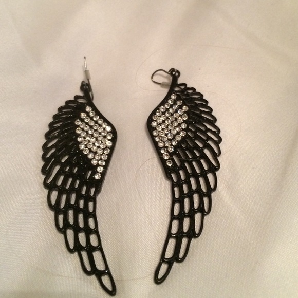 Black wings with stones