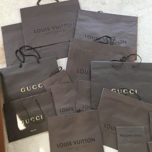 Gucci & Louis Vuitton shopping bags .