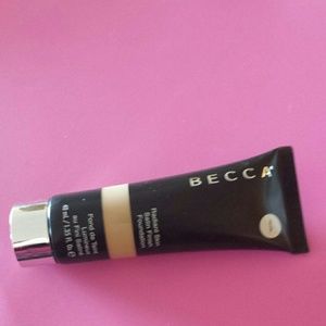 Becca Radiant Skin Foundation. Shade: Nude