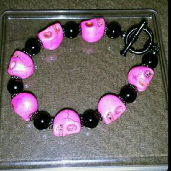Pink and black skull bracelet