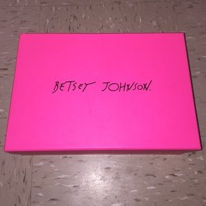 Betsy Johnson black leather pointed toe pumps.