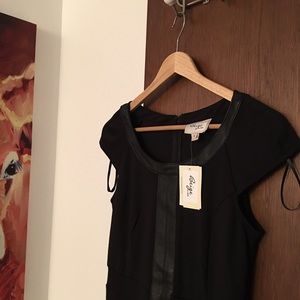 Black dress by beige