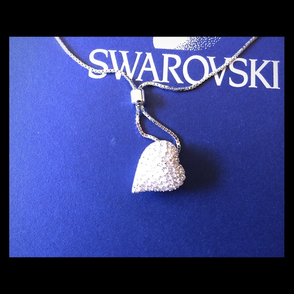 Authentic Swarovski crystal pave' heart necklace.