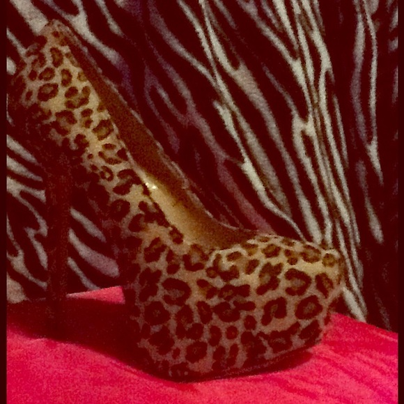 Leopard platform heels size 7.5