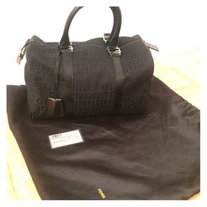 Fendi bowler bag plastic still on metal!