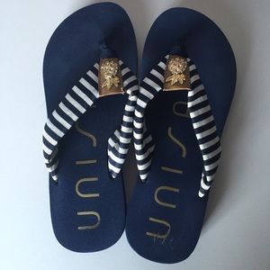 Gold pineapple flip flops