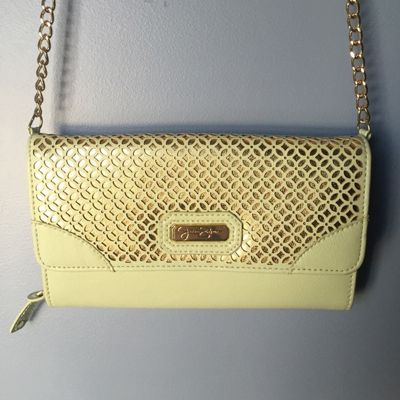 Jessica Simpson over the should clutch