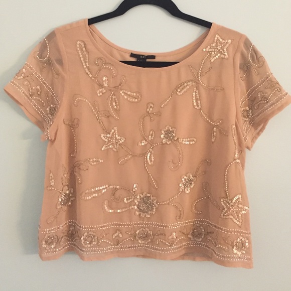 Slightly cropped beaded shirt