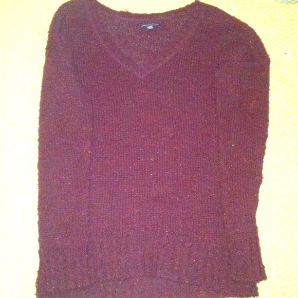 Warm burgundy sweater.