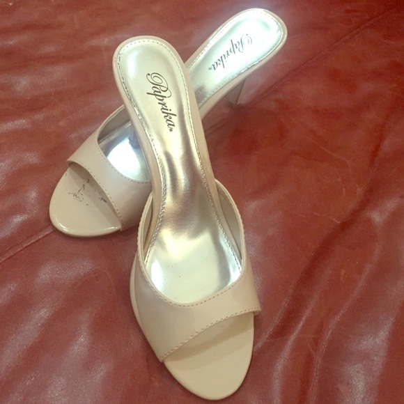 Lightly used, size 9 cream color slip on heels