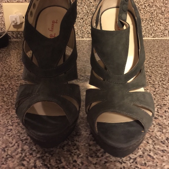 Grey high heeled shoes