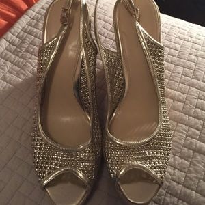 Calvin Klein gold wedges