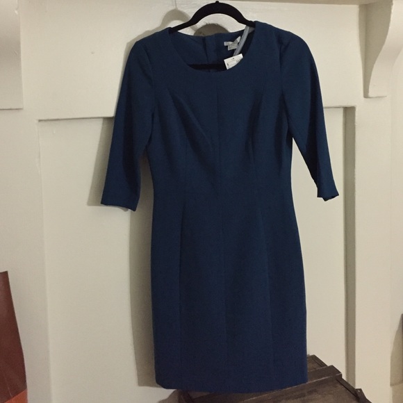 Brand new . 3/4 sleeve . blue fitted dress