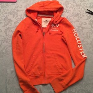 Orange hollister zip up.