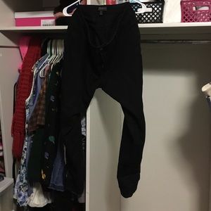 Black pants with zipper ankles