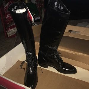 H.J. Justin black calf leather boots.