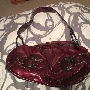 Burgandy small handbag.