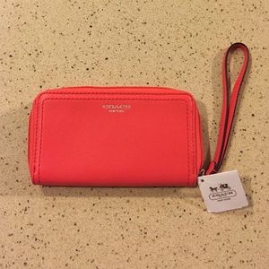 Coach bright coral leather wristlet