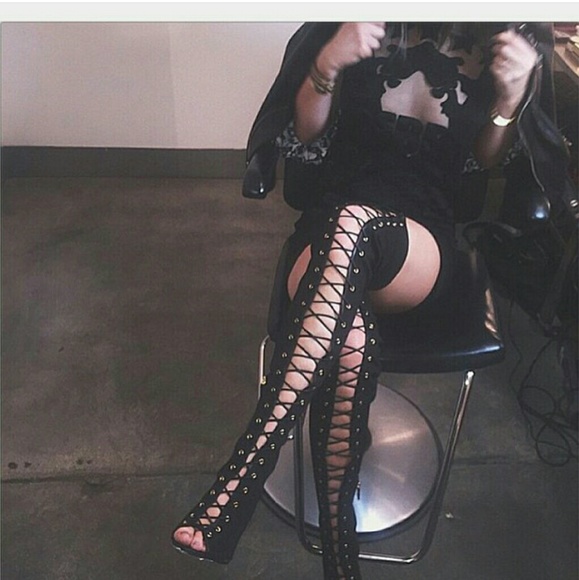 Thigh high lace up boots