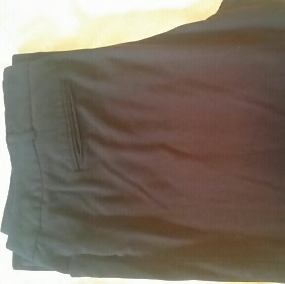 Black slacks, London fit.