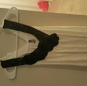 Long, free flowing tank w/ beaded neckline accent