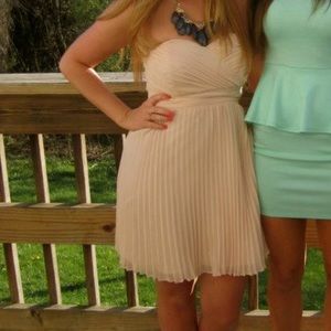 Strapless pale pink pleated dress