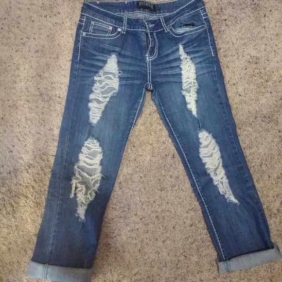 Distressed capris with bling pockets