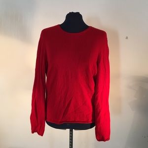 Red cashmere sweater.