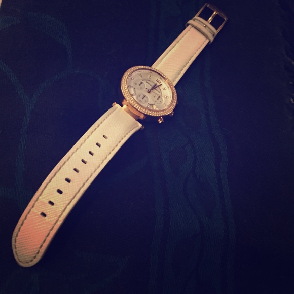 White leather band. Rose gold, no scratches.