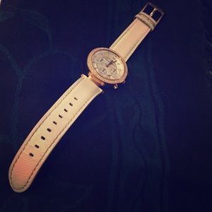 White leather band. Rose gold, no scratches.