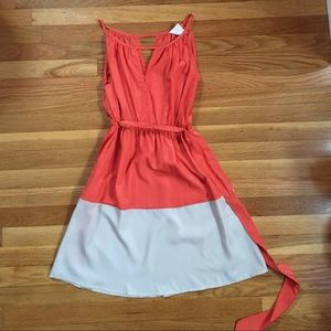 Boutique orange and cream dress
