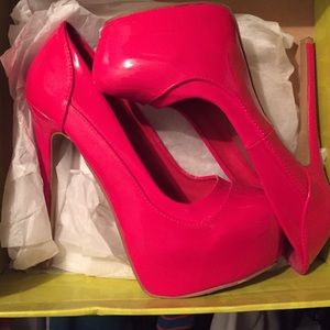 Red high heel pumps