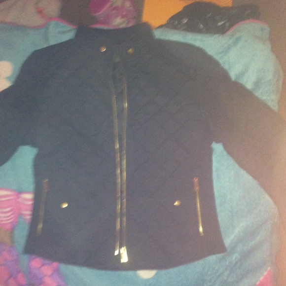 A light coat really cute black and gold brand new. - Picture 1 of 3
