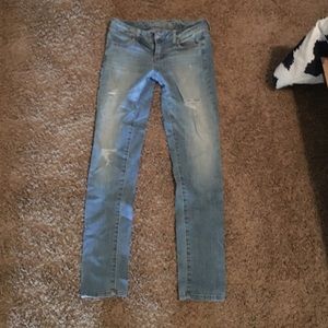 Ae destroyed light wash jeans