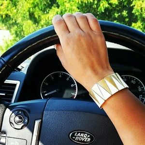 White and white jcrew statment bracelet.