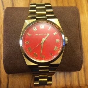 Michael Kors gold Channing watch with orange face