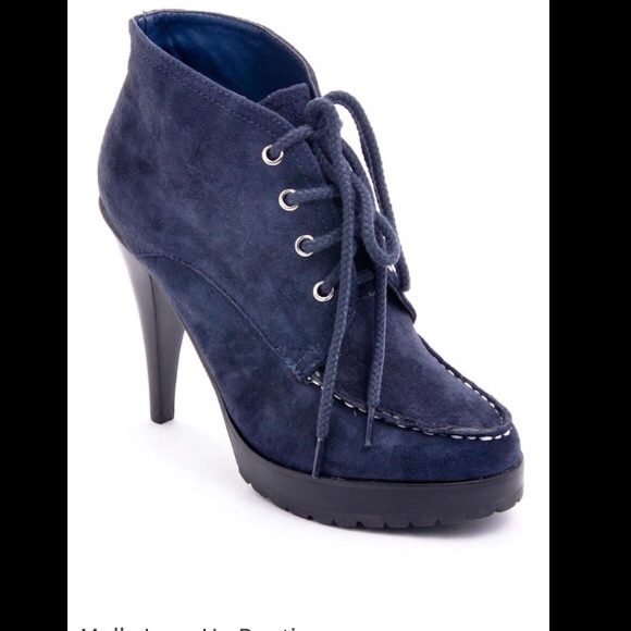 Lace up high heeled booties