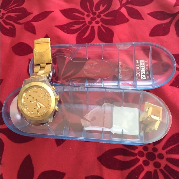 Gold tone Swatch Watch
