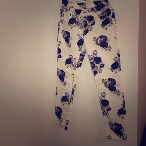white jeans with black floral print