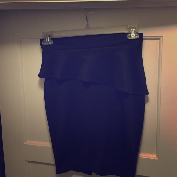 Black pencil skirt with angled ruffle
