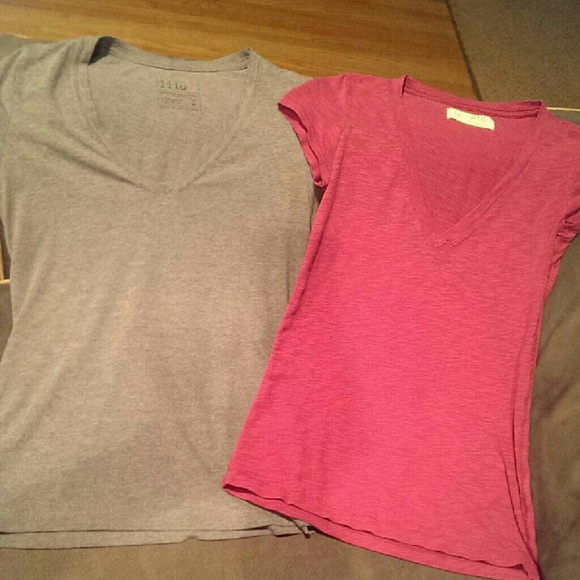 Two V-neck short sleeved shirts