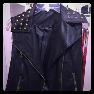 Black leather sleeveless vest