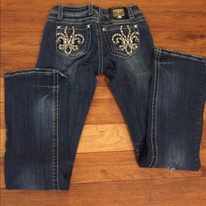 Studded destructed jeans