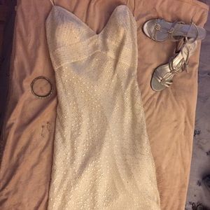 White silk cocktail dress with silver sequins.