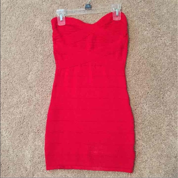 Strapless red bodycon dress.