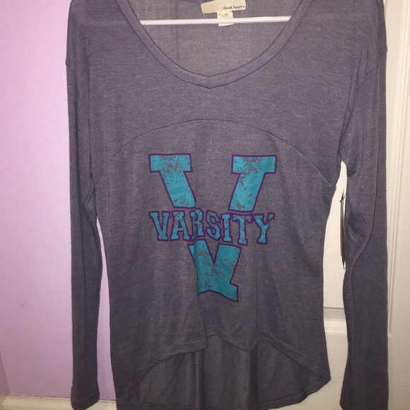 A brand new long sleeve Derek Heart tee shirt