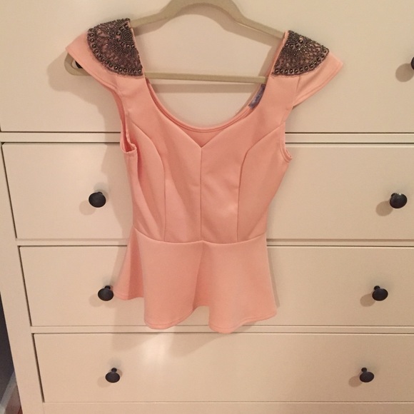 Light pink/peach peplum top