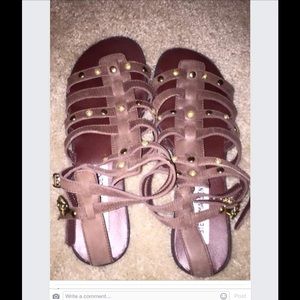 Brown leather sandals.