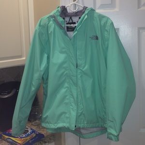 women's Northface rain jacket in mint green