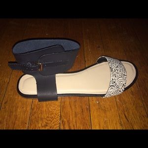 Black and cream Just Fab sandals.